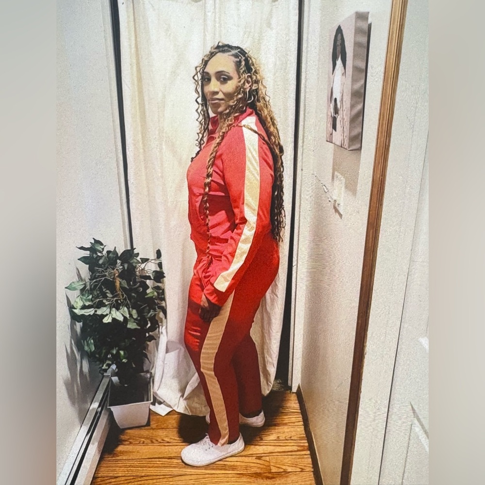 Red and cream sweat suit